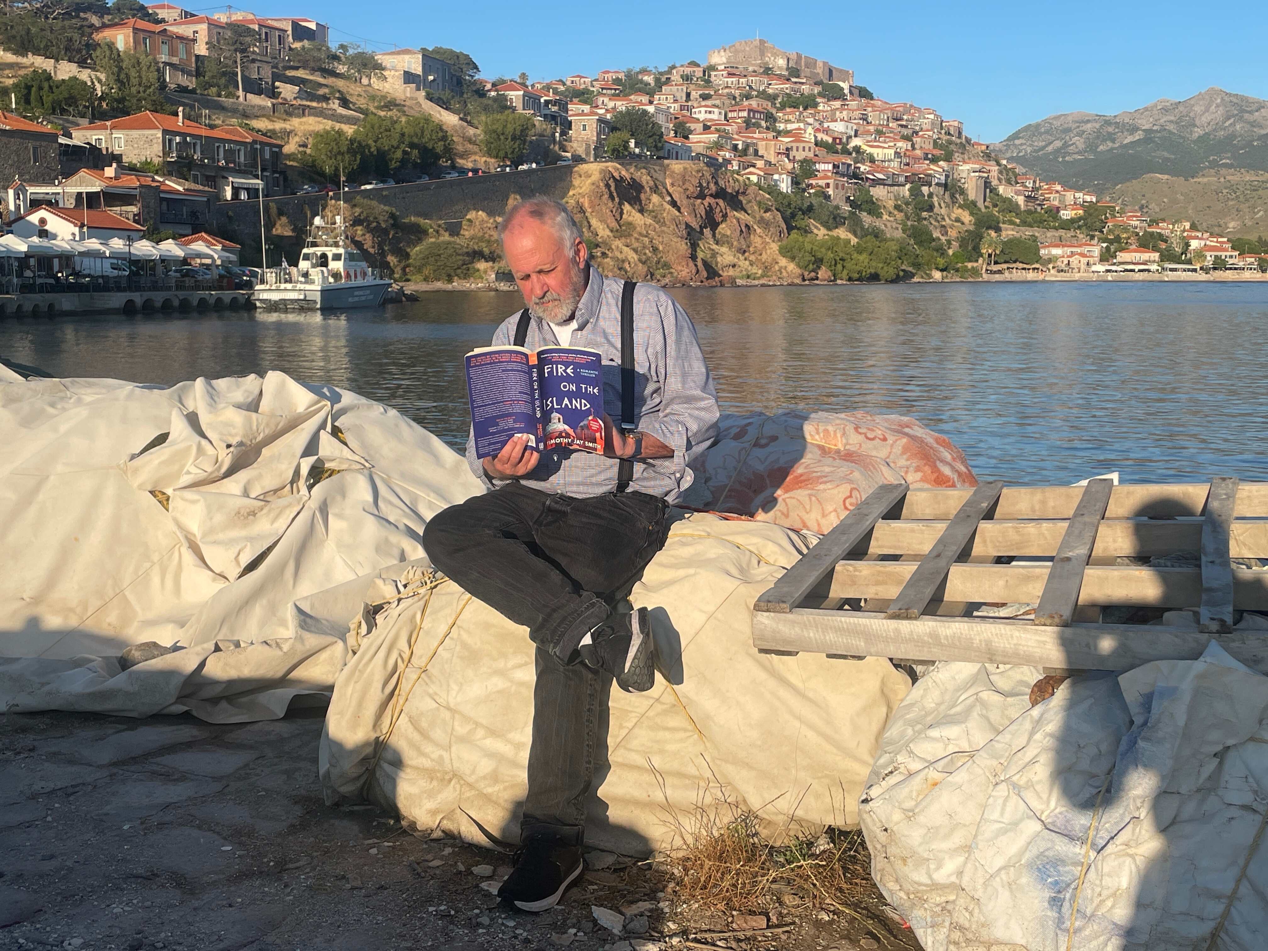 Tim reading in harbor 1