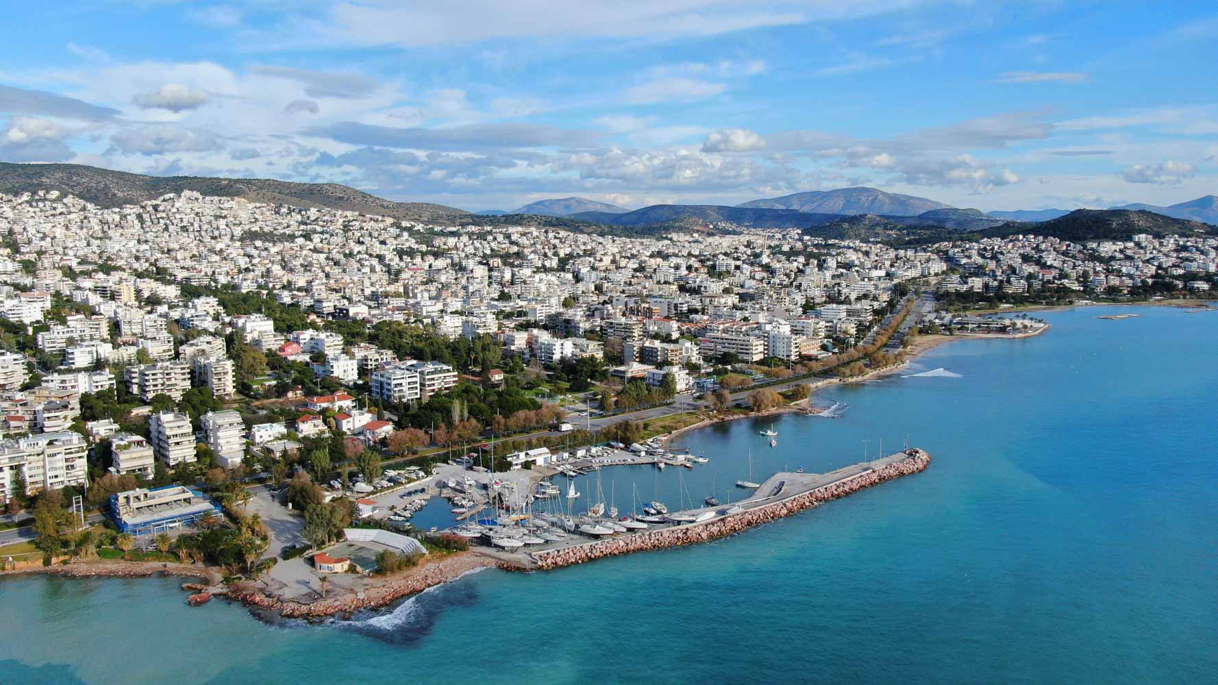 Aerial drone photo of small marina with boats anchored in Voula, Athens riviera, Attica, Greece